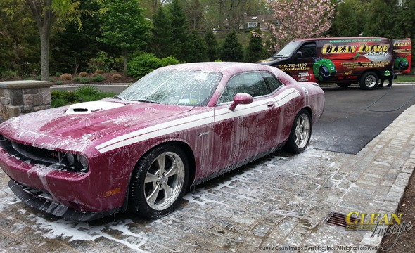 Pink Dodge Challenger foam bath.