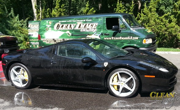 Black Ferrari after foam bath.