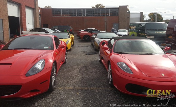 Group of differently colored Ferrari sports cars after fresh detailing.