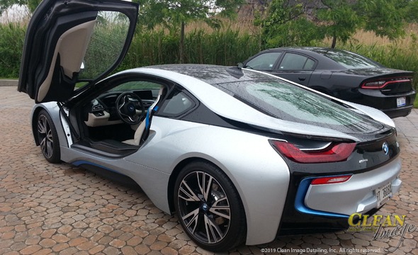 BMW electric sports car with door open.